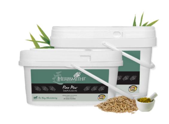 Two white plastic tubs of Herbsmith Flax Plus Impulsion supplement with a small pile of flax seeds and a scoop