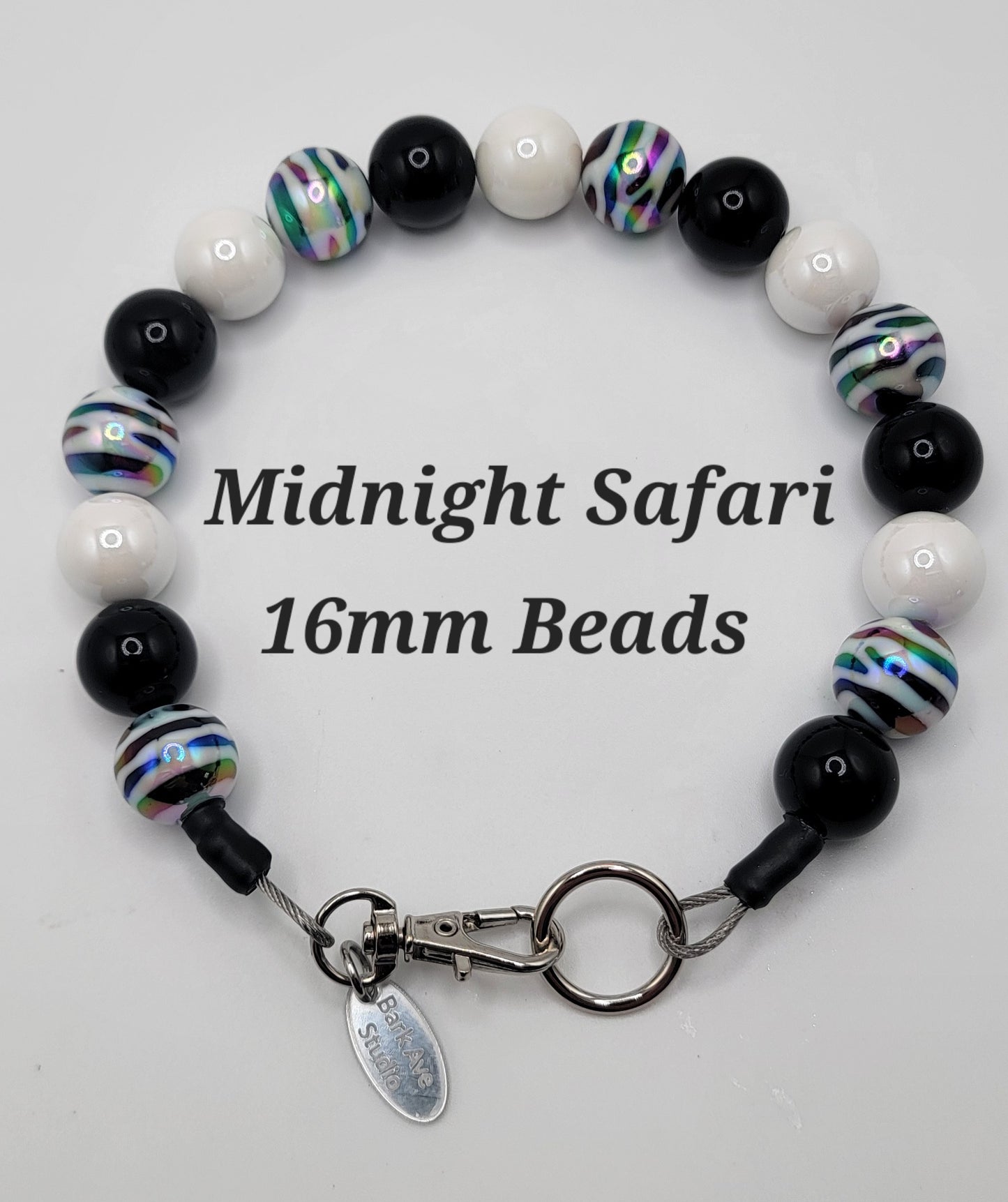 Midnight Safari 16mm beads, black, white, and iridescent striped beads with a silver clasp