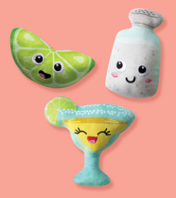 A plush lime wedge, salt shaker, and margarita glass with smiling faces