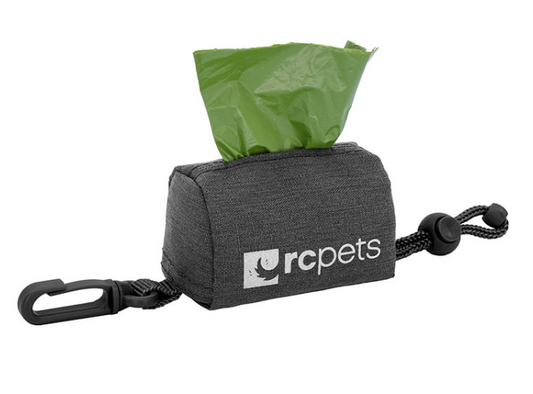 RC Pets grey dog waste bag dispenser with green bag emerging, black clip and toggle