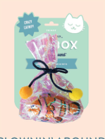 A cat toy in a clear iridescent bag with a black tie and two yellow pom-poms