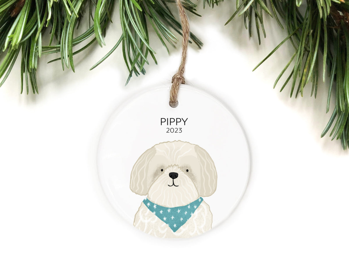 Pippy 2023 ornament with a white dog wearing a blue bandana