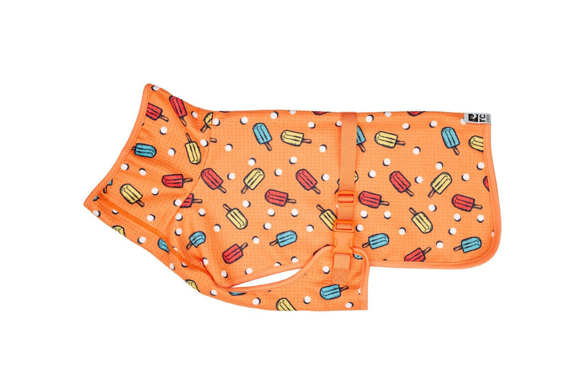 Orange dog cooling vest with a pattern of red, yellow, and blue popsicles