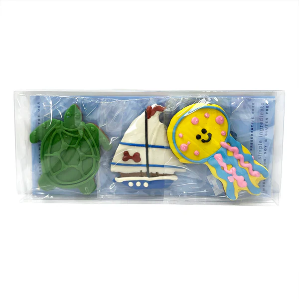 Bubba Rose Biscuit Co Summer Beach Box featuring turtle sailboat and jellyfish shaped dog treats