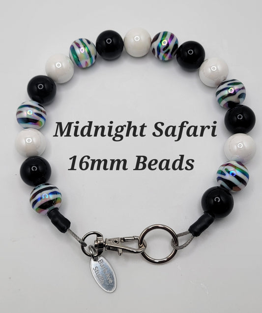 Midnight Safari 16mm beads, black, white, and iridescent striped beads with a silver clasp