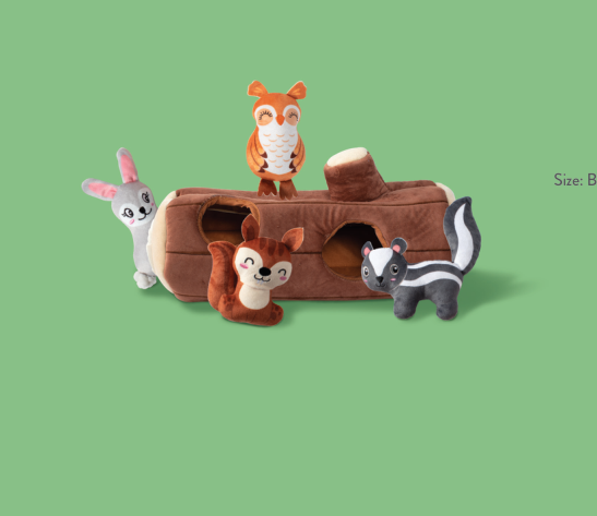 Plush log toy with a bunny, squirrel, owl, and skunk peeking out