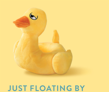 Yellow plush duck toy with an orange beak and a sad expression