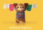 Sloth plush toy wearing a Tacos and Tequila shirt, holding a rope toy with pink and green patterned ends