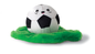 Fringe Studio JUST KICK IT PLUSH DOG TOY, a plush soccer ball with a smiling face on green faux grass