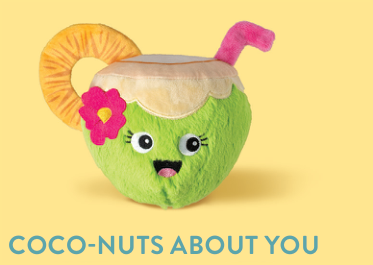 Green coconut plush toy with a pink flower, straw, and pineapple slice