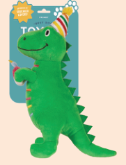 Green dinosaur plush toy wearing a party hat and holding a candle