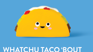 A smiling taco toy with a yellow shell, brown filling, green lettuce, red tomatoes, and white sour cream