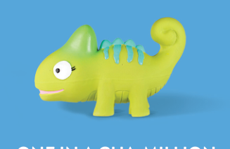 A green chameleon toy with light blue ridges on its back