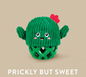 Green cactus dog toy with a red flower on its head and a green lattice base