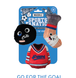 Wagsdale Sports Fanatic dog toy collection with a black puck, a hockey stick, and a red sweater