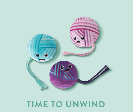 Three yarn balls with faces, one blue, one pink, and one purple, with the text Time to Unwind