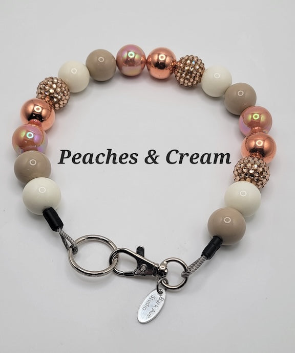 Peaches & Cream dog collar with rose gold, cream, and taupe beads, and a silver clasp