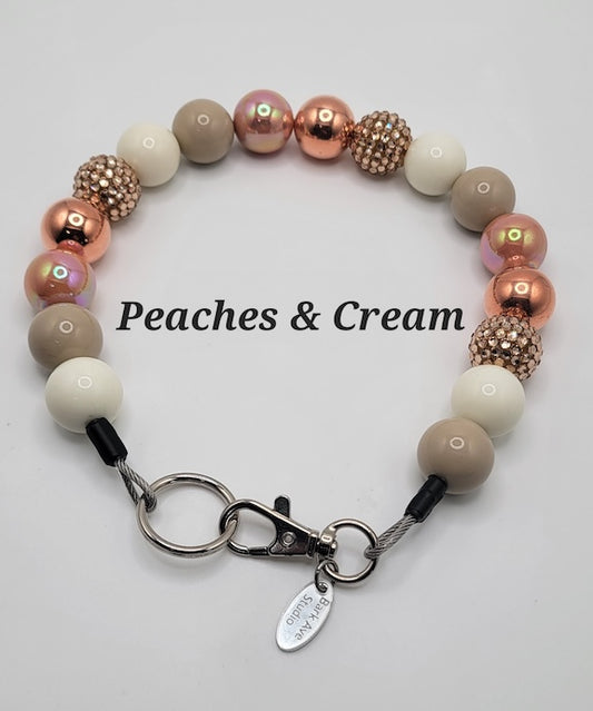 Peaches & Cream dog collar with rose gold, cream, and taupe beads, and a silver clasp