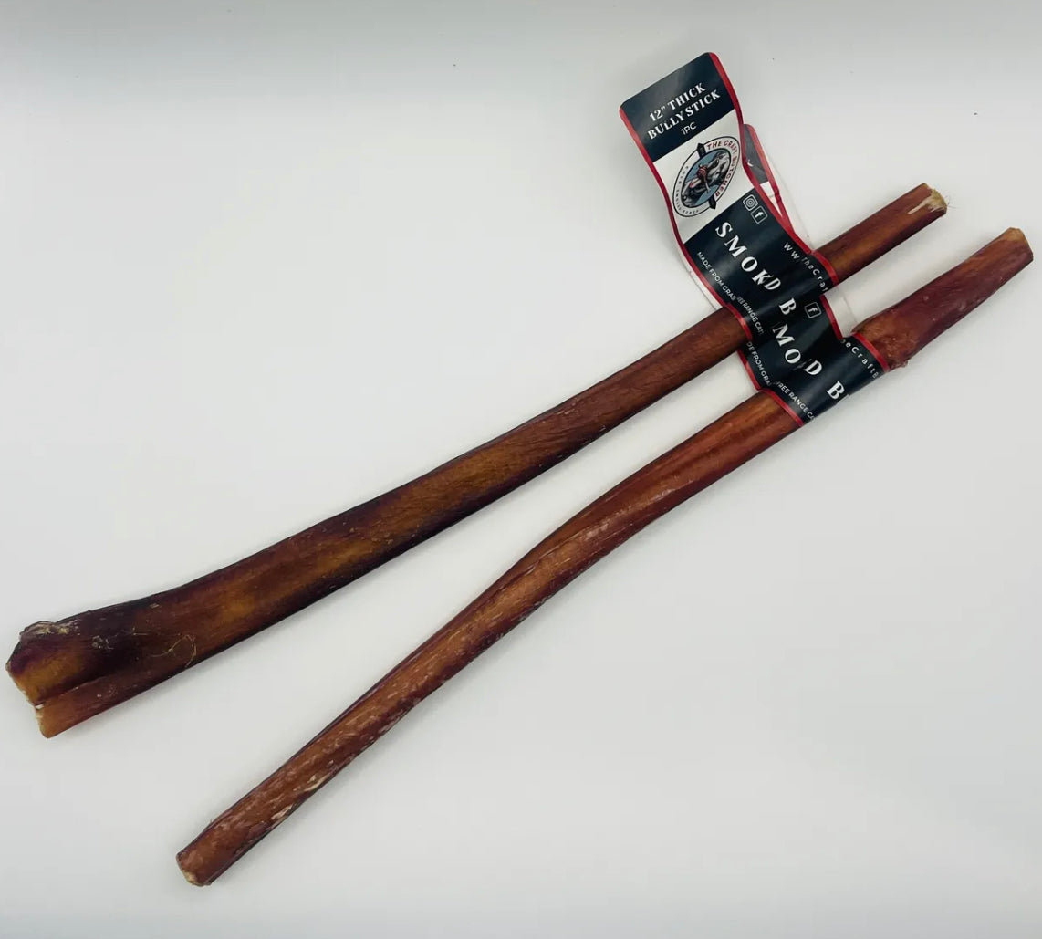 Two 12-inch thick bully sticks from The Craft, one with a black and red label