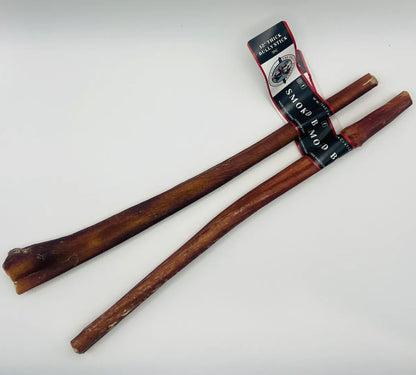Two 12-inch thick bully sticks from The Craft, one with a black and red label