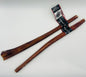 Two 12-inch thick bully sticks from The Craft, one with a black and red label