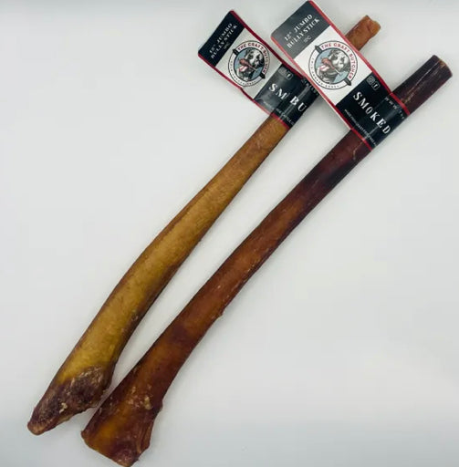 Two Smoked Bully Sticks from The Craft Butcher Bones, one light brown, one dark brown