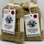 Two Himalayan Yak Cheese Dog Chews in burlap bags with The Craft Butcher branding