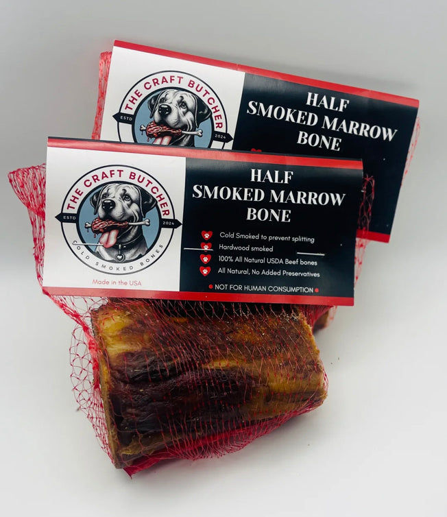 Two Half Smoked Marrow Bones by The Craft Butcher in red mesh packaging