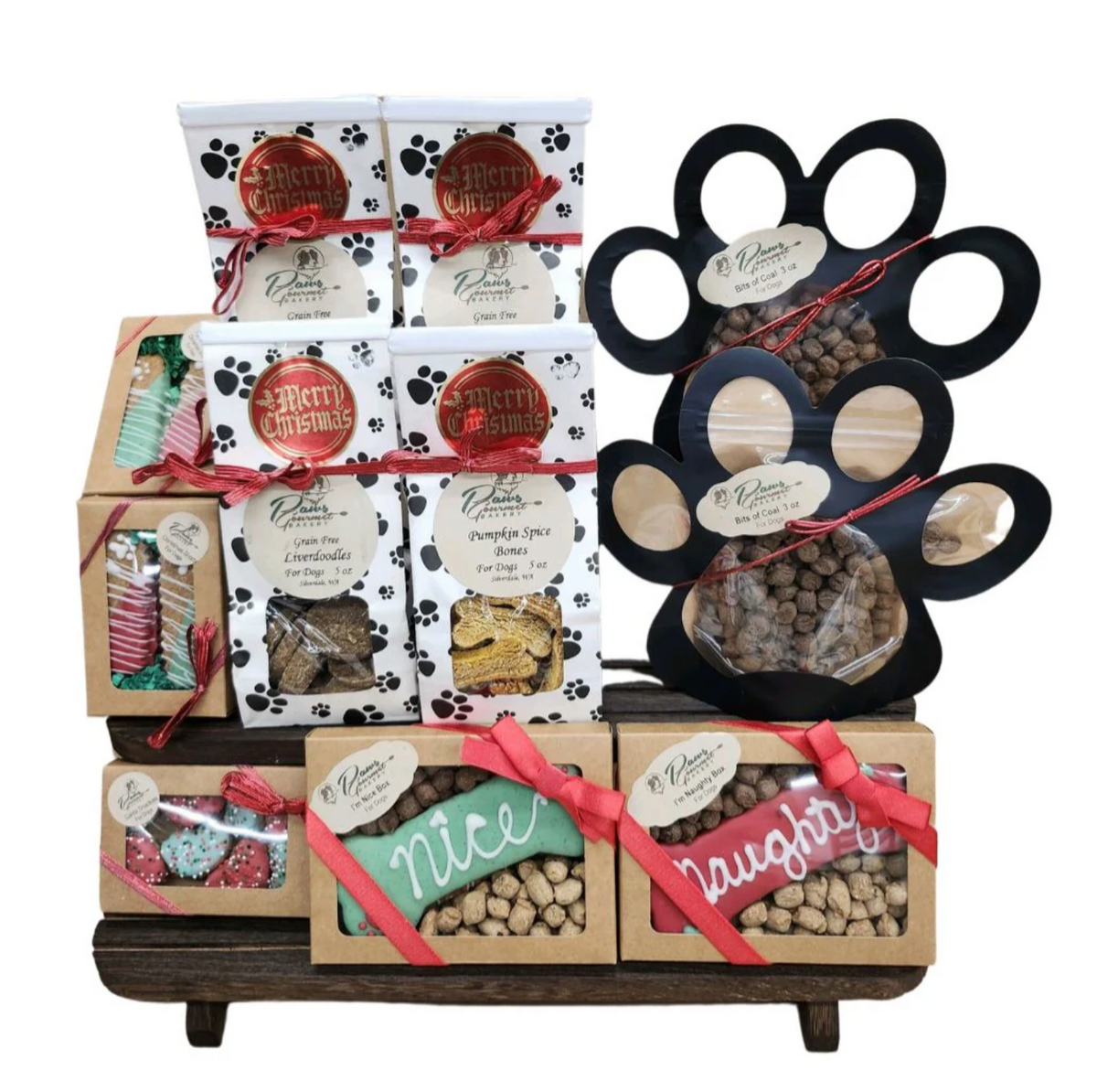 Paws Gourmet Bakery Holiday Christmas Seasonal Decorated dog treats and gift boxes