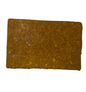 Rectangular block of solid brown material with a textured surface