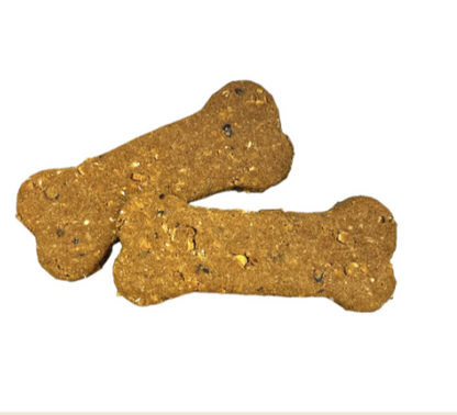 Two bone-shaped dog biscuits with visible specks of ingredients