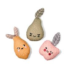Three soft fabric toys shaped like a pear, an orange fruit, and a pink apple, each with embroidered faces