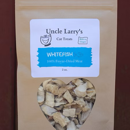 Uncle Larrys Whitefish 100% Freeze-Dried Meat cat treats in a 2 oz bag with a heart-shaped window