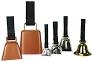 Assortment of bells including two brown cowbells and four silver and gold handbells
