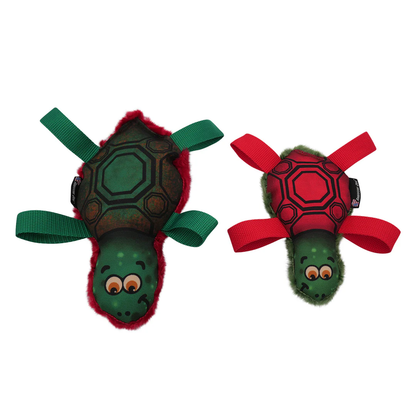 Two turtle-shaped dog toys, one green and one red, with fabric legs and plush trim