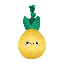 Yellow pineapple dog toy with green leaves and a smiling face