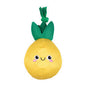 Yellow pineapple dog toy with green leaves and a smiling face