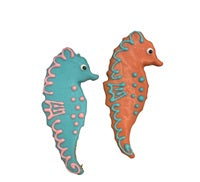 Paws Gourmet Bakery Year Round Sea Horses dog treats in blue and orange