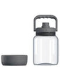 Clear water bottle with dark grey lid and handle, next to a dark grey silicone boot
