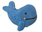 Blue whale shaped cookie with pink tongue and black smile