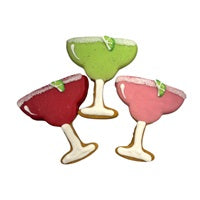 Three margarita shaped cookies, one green, one red, and one pink, each with a lime wedge