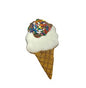 Ice cream cone shaped dog treat with white frosting, brown frosting, and colorful sprinkles