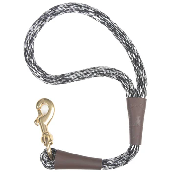 Black and white braided rope dog leash with a brass clip and brown leather accents