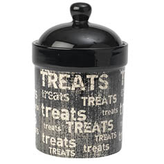 Black ceramic treat jar with the word TREATS in white text repeated on the side