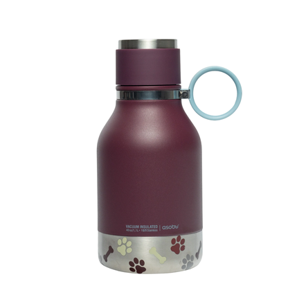 Asobu Dog Bowl Bottle in plum with a light blue handle, featuring paw prints and bones on the base